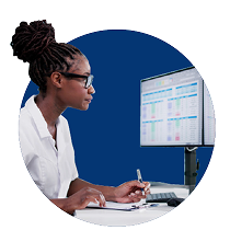 Staff Member at Computer